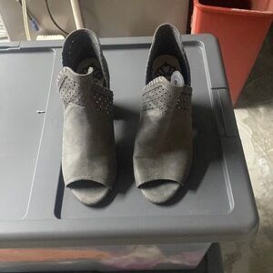 Peep toe leather she’s/booties. Size 7